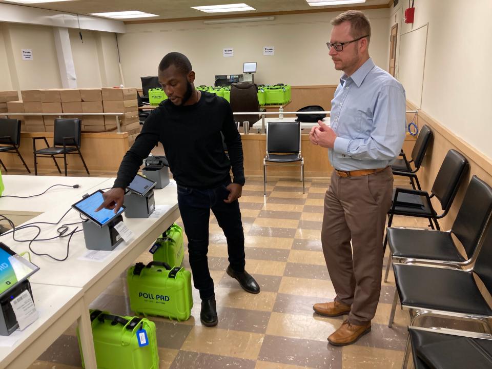 Lebanon County Elections Director Sean Drasher works with KNOWiNK representative Mark Hurst Thursday, March 21, setting up the electronic poll books in advance of the April 23 presidential primary.