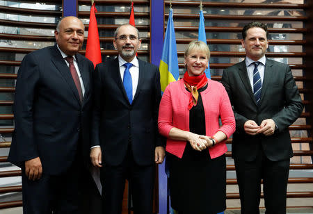 (L-R) Egyptian Foreign Minister Sameh Shoukry, Jordanian Foreign Minister Ayman Safadi, Swedish Foreign Minister Margot Wallstrom and UNRWA Commissioner-General Pierre Krahenbuhl pose at the end of a summit, to address Palestinian UNWRA funding crisis, at the U.N. Food and Agriculture Organization (FAO) headquarters in Rome, Italy March 15, 2018. REUTERS/Remo Casilli
