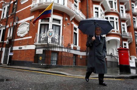 A man walks past the Ecuadorian Embassy where WikiLeaks founder Julian Assange is taking refuge, in London, Britain September 16, 2016. REUTERS/Peter Nicholls