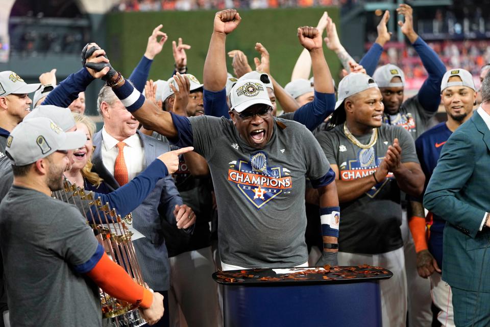 Astros manager Dusty Baker Jr. celebrates the World Series title with his team.