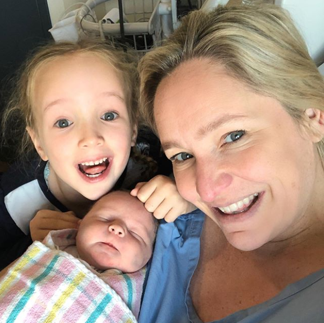 Fifi Box pictured with her newborn baby girl DAisy