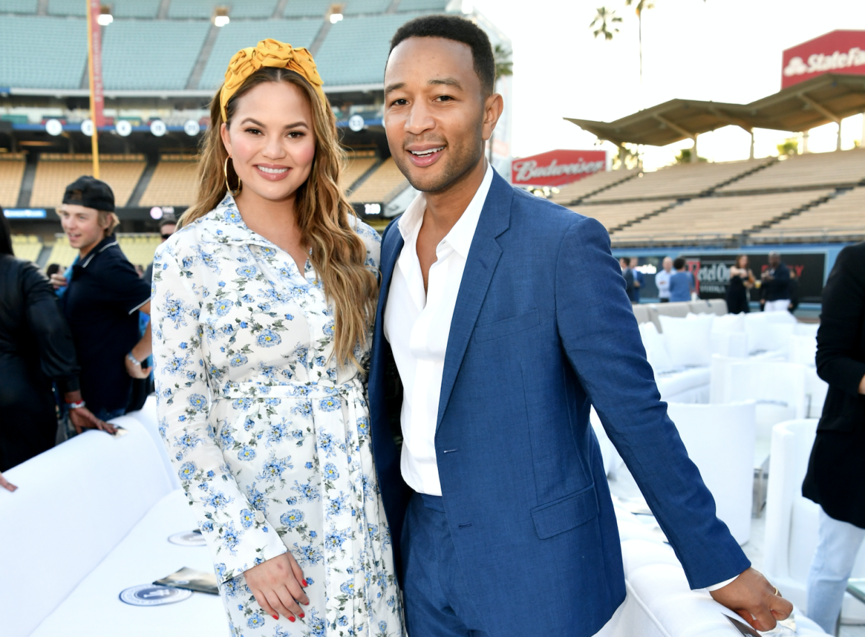 Chrissy Teigen and John Legend got real about parenting on social media. [Photo: Getty]