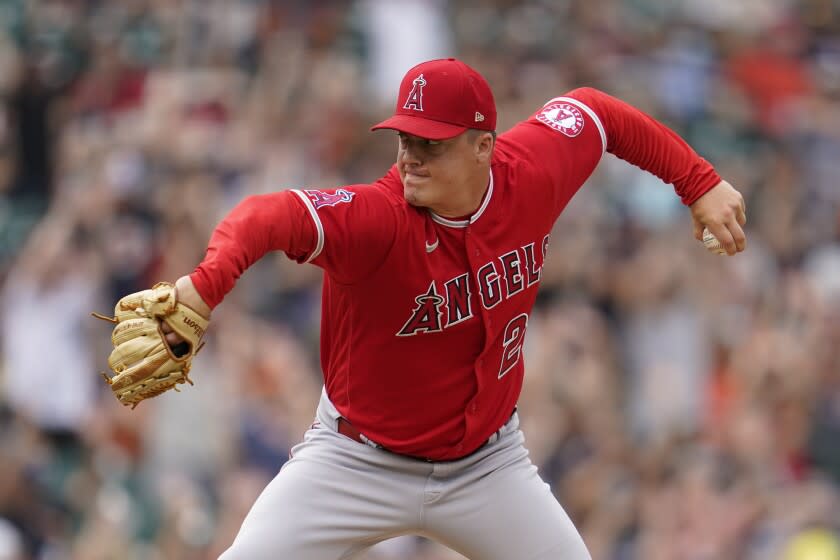 Los Angeles Angels relief pitcher Aaron Loup throws against the Detroit Tigers.
