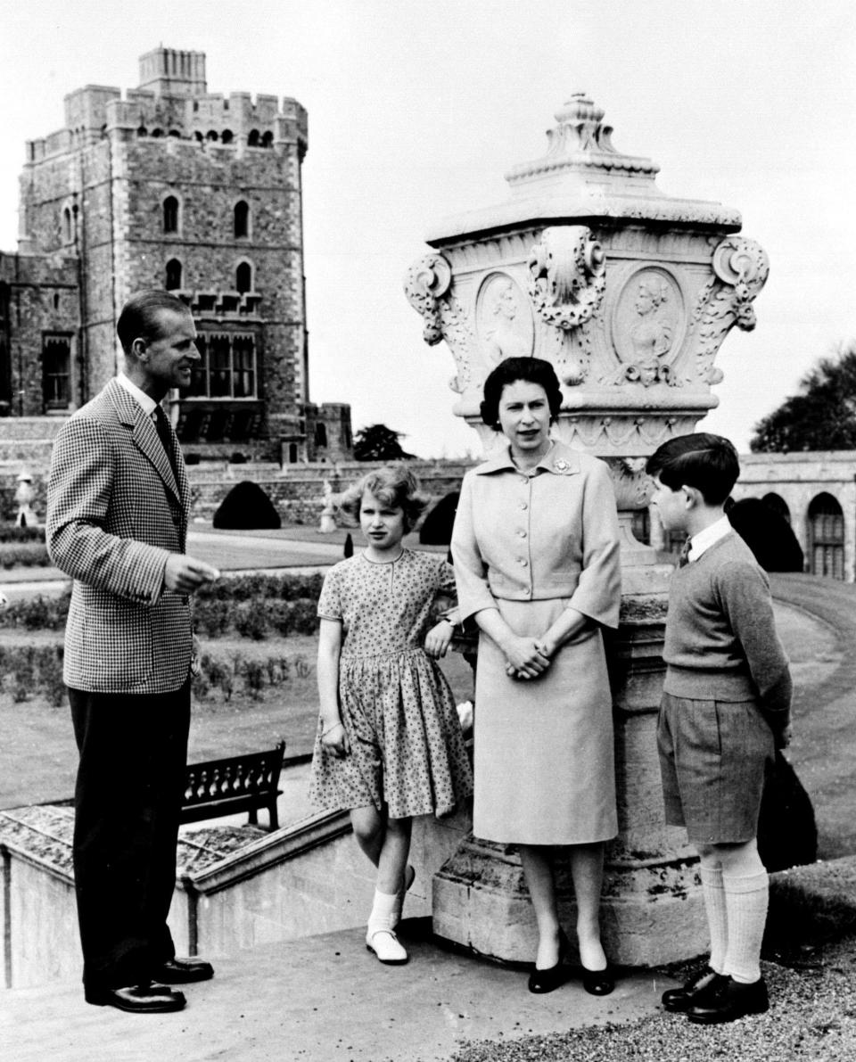 Queen Elizabeth II and Duke of Edinburgh with their children, Prince Charles, Prince of Wales and Princess Anne, the Princess Royal,at the top of the East Terrace Garden Steps at Windsor Castle, Berkshire.   (Photo by PA Images via Getty Images)