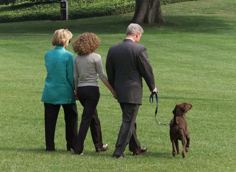 The Clintons departing the White House in August 1998