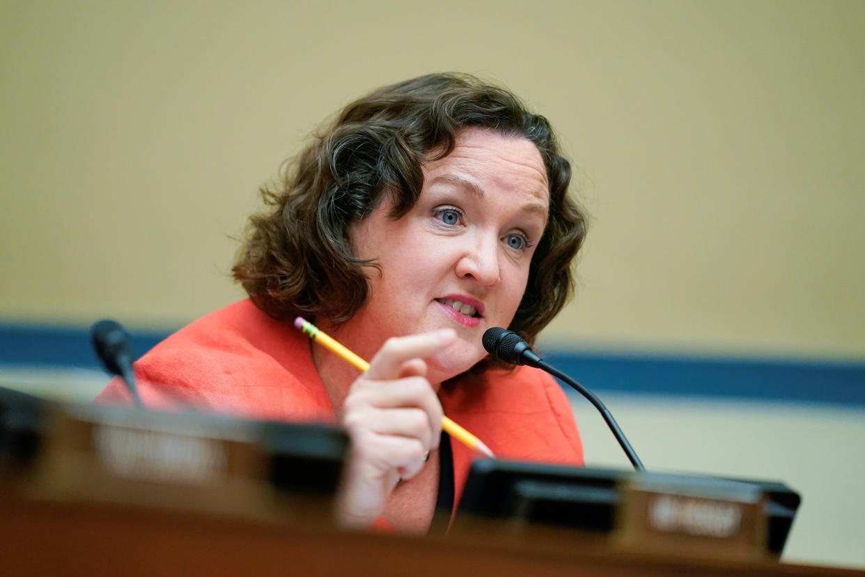 Rep. Katie Porter, D-Calif., holding a pencil, speaks during a hearing on gun violence on Capitol Hill.
