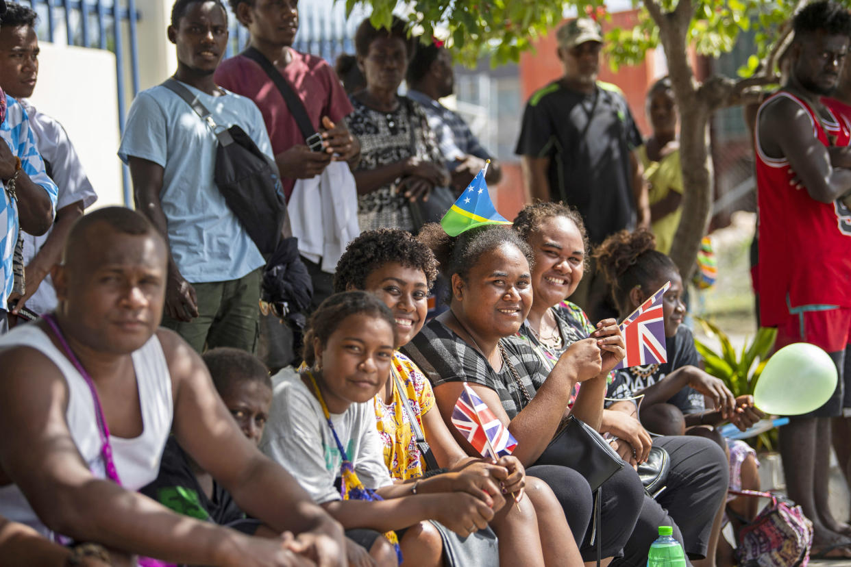 Members of the public Prince of Wales's motorcade during his royal visit to the Solomon Islands. Source: AAP