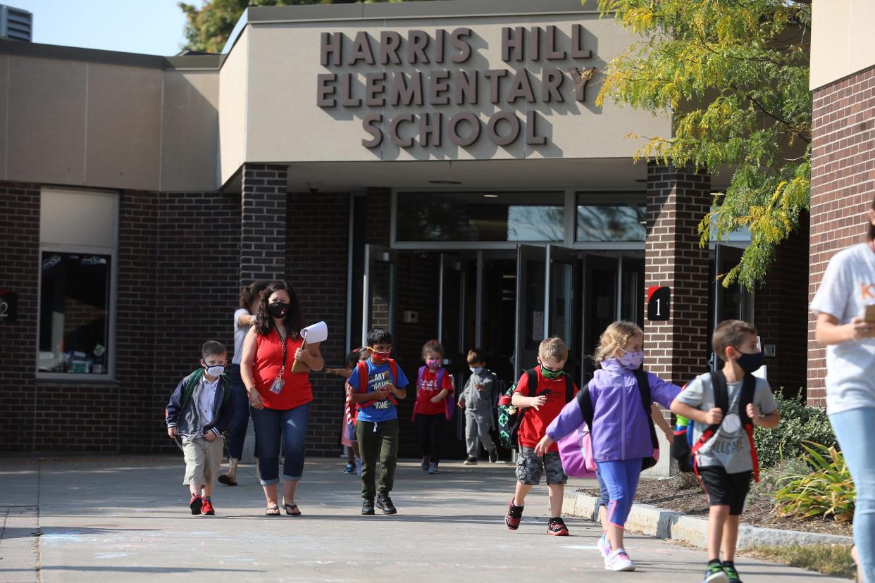 Students leave for the day Harris Hill Elementary School in Penfield on Sept. 25, 2020.