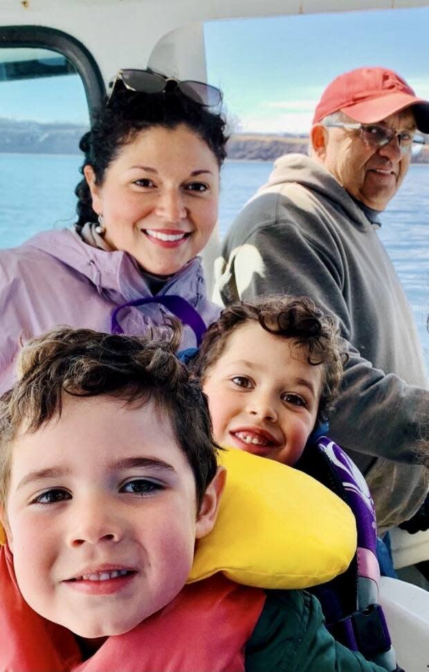 Alysa Collins, seen here with her father Keith Daley and her sons, Trent and Hudson, expects both of her boys will join the lobster fishing crew next season and carry on the family tradition. 