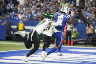Indianapolis Colts' Michael Pittman makes a touchdown catch against New York Jets' Bryce Hall (37) during the first half of an NFL football game, Thursday, Nov. 4, 2021, in Indianapolis. (AP Photo/Michael Conroy)
