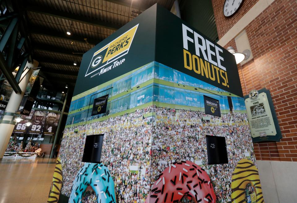 A new donut vending machine inside the Lambeau Field Atrium offers fans signed up on the Packers Perks app a free Kwik Trip glazer on home game days while supplies last.
