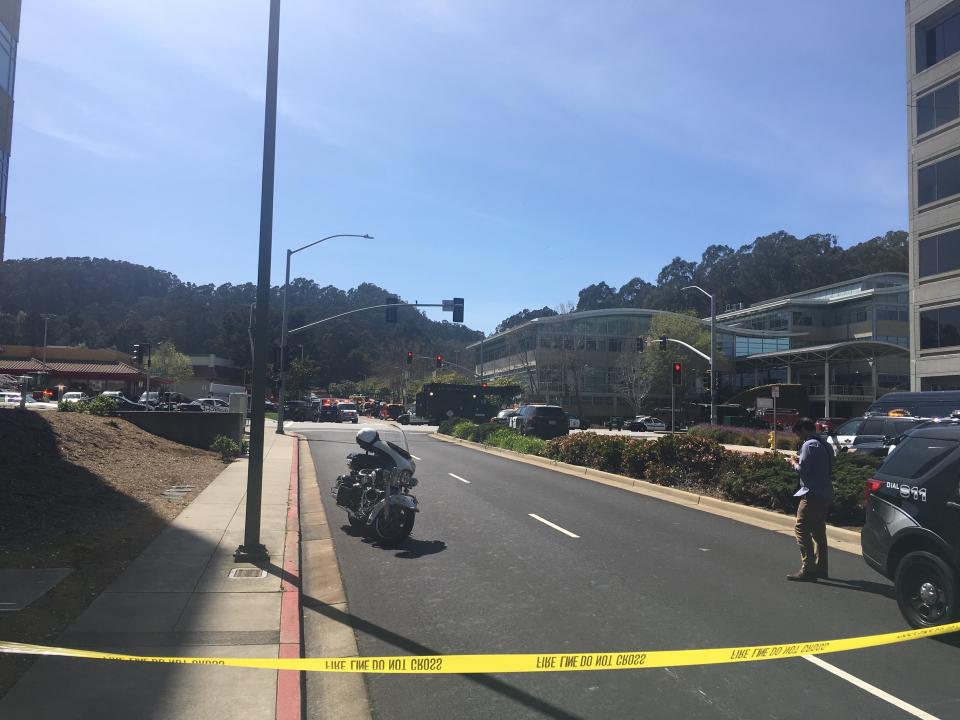 <p>The offices of YouTube are seen in the distance outside after an active shooting at YouTube’s offices in San Bruno, Calif. on April 3, 2018. (Photo: Josh Edelson/AFP/Getty Images) </p>