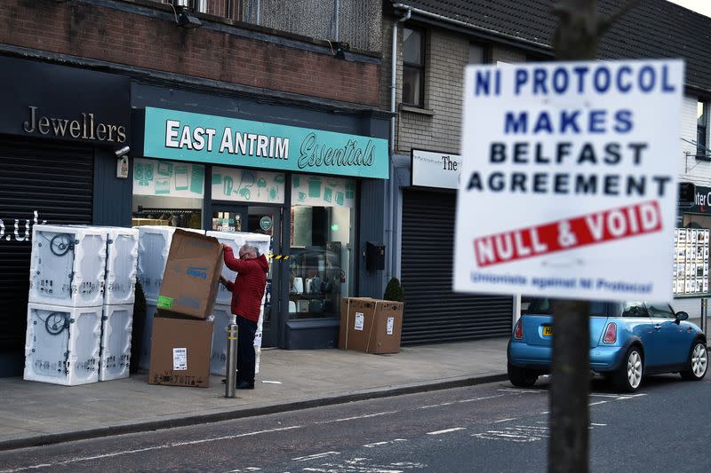 A sign is seen with a message against the Brexit border checks in relation to the Northern Ireland protocol in Larne