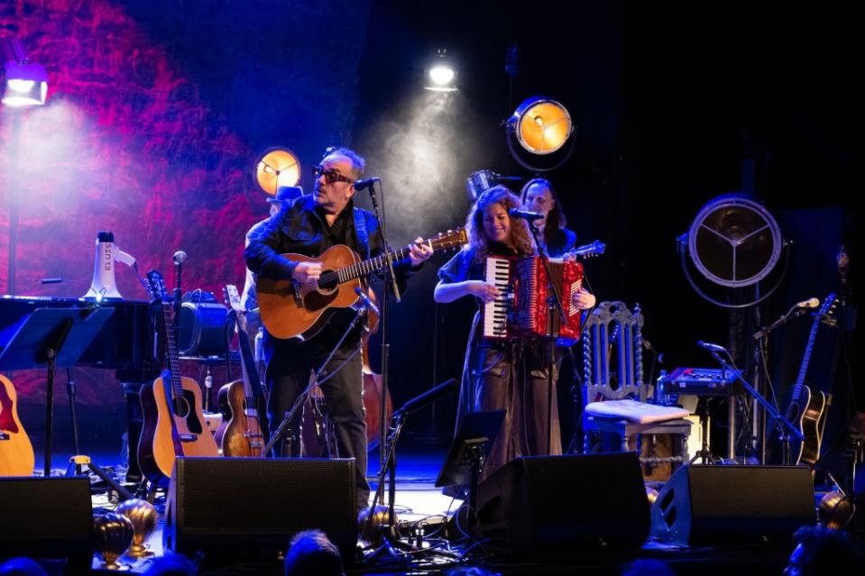 Elvis Costello and the mandolin player is Colin Nairne and the accordion is Brigid Kaelin : Photographer: Danielle Vaughan
