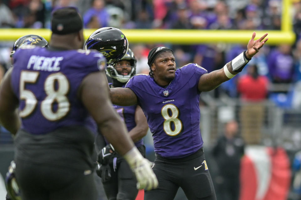 Sep 24, 2023; Baltimore, Maryland, USA;Baltimore Ravens quarterback Lamar Jackson (8) reacts when a fourth down play is reviewed on the jumbotron during overt time against the Indianapolis Colts at M&T Bank Stadium. Mandatory Credit: Tommy Gilligan-USA TODAY Sports