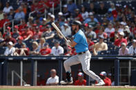 FILE - In this March 2, 2020, file photo, Miami Marlins' Matt Joyce bats during the second inning of a spring training baseball game against the Washington Nationals, in West Palm Beach, Fla. Marlins Park will have a new look for its 2020 season debut Friday, Aug. 14, 2020. And the roster looks a lot different than it did. (AP Photo/Jeff Roberson, File)