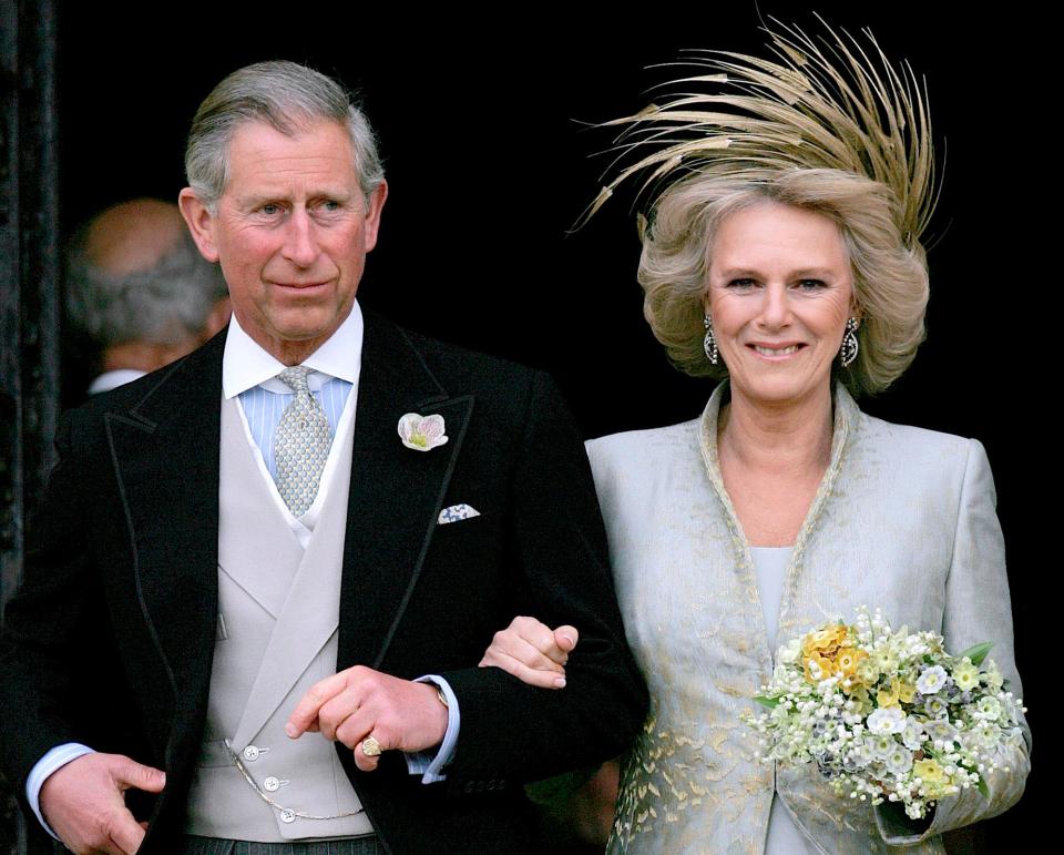 ritain's Prince Charles and his bride Camilla Duchess of Cornwall leave St George's Chapel in Windsor, England following the church blessing of their civil wedding ceremony on April 9, 2005.