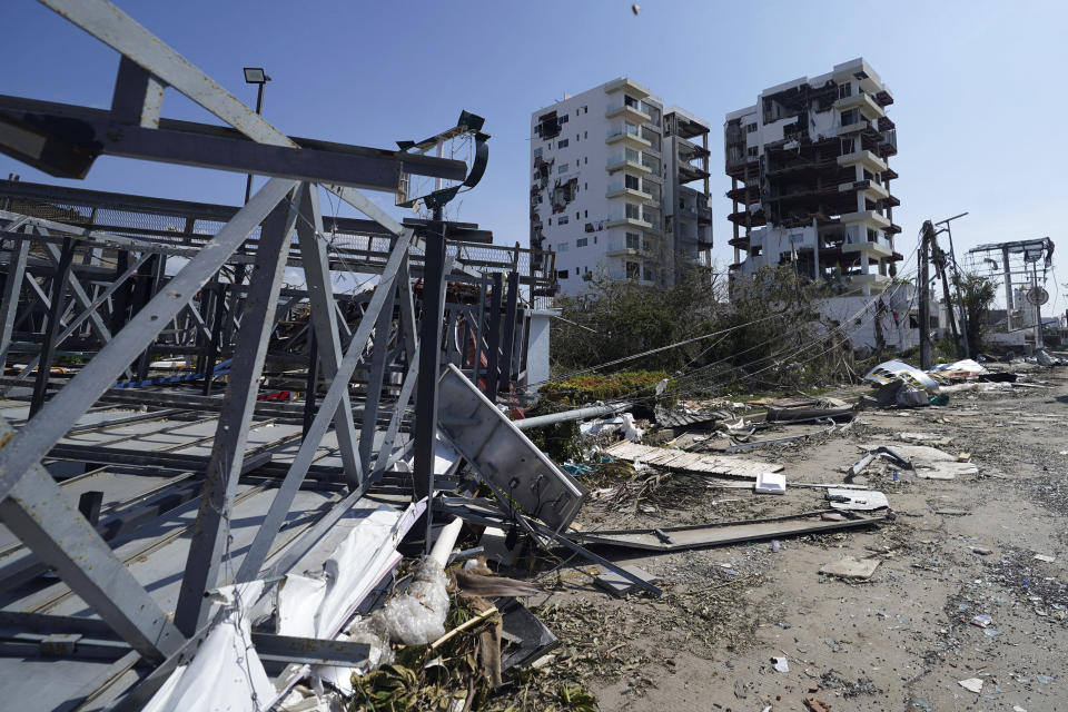 Hotels affected by Hurricane Otis stand two days after the passage of the Category 5 storm in Acapulco, Mexico Friday, Oct. 27, 2023. (AP Photo/Marco Ugarte)