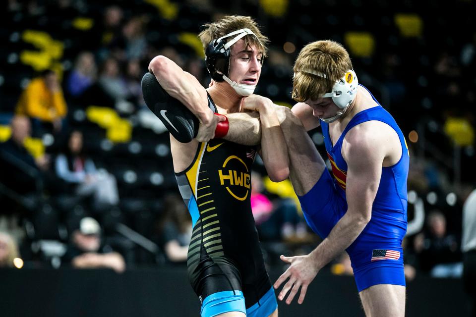 Drake Ayala, left, wrestles Trever Anderson at 125 pounds during the Soldier Salute college wrestling tournament, Thursday, Dec. 29, 2022, at Xtream Arena in Coralville, Iowa.