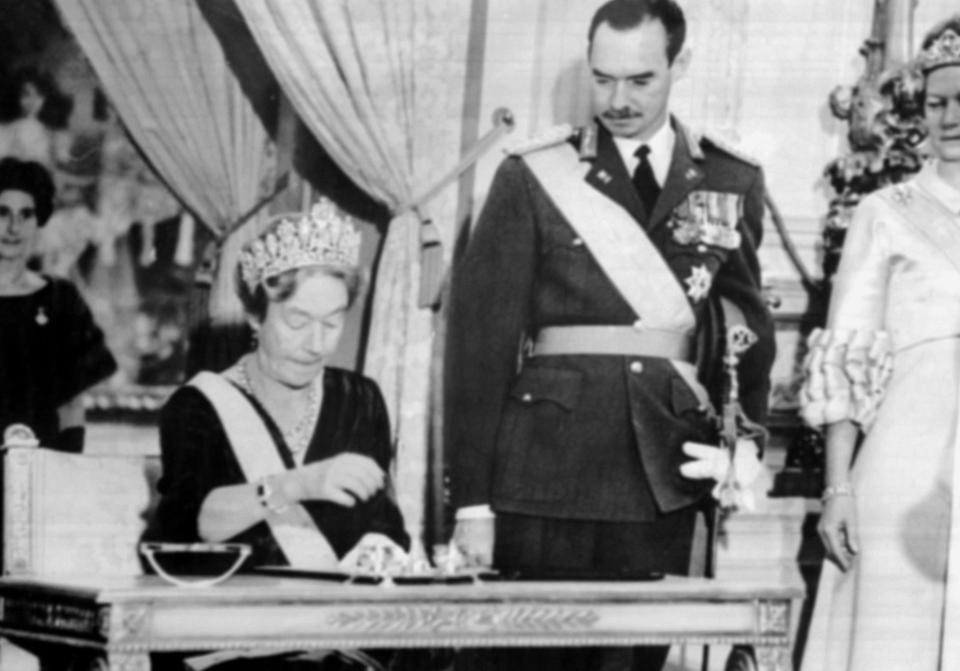 The Grand Duchess Charlotte of Luxembourg signs an abdication act in November 1964 in favour of her son, the Grand Duke Jean of Luxembourg. (AFP/Getty Images)