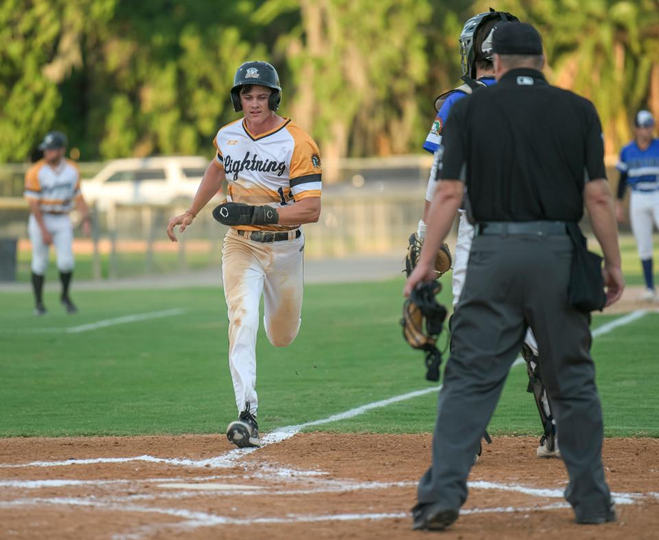 Leesburg's Michael Furry (14) scores Friday in the Lightning home opener against the Sanford River Rats at Pat Thomas Stadium-Buddy Lowe Field in Leesburg.