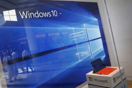 FILE PHOTO: A display for the Windows 10 operating system is seen in a store window of the Microsoft store at Roosevelt Field in Garden City, New York, U.S., July 29, 2015. REUTERS/Shannon Stapleton/File Photo