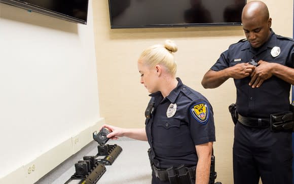 Police putting on body cameras