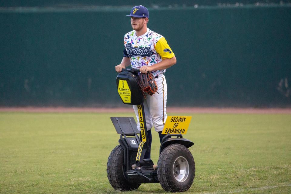 Savannah Bananas relief pitcher Nate Peterson enters the game via a Segway at Grayson Stadium.