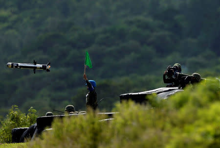 A Javelin missile is fired during annual Han Kuang military drill simulating the China's People's Liberation Army (PLA) invading the island, in Pingtung county, southern Taiwan August 25, 2016. REUTERS/Tyrone Siu/File Photo