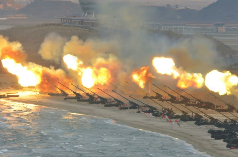 A large-scale intensive striking drill of long-range artillery pieces of the KPA large combined units pictured at an undisclosed location in North Korea in this undated photo