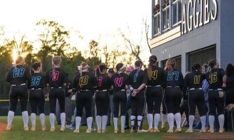 Tate softball wore multi-colored jerseys to represent all the different types of cancers and their ribbons.