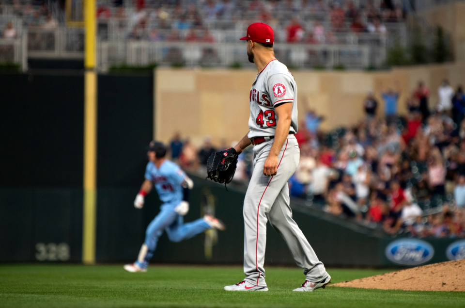 The Angels' Patrick Sandoval gives up a double to the Twins' Brent Rooker in the ninth inning.