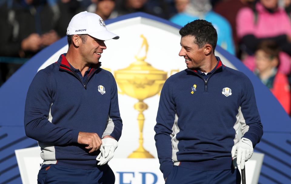 Former Ryder Cup team-mates Paul Casey, left, and Rory McIlroy are in medal contention (David Davies/PA) (PA Archive)