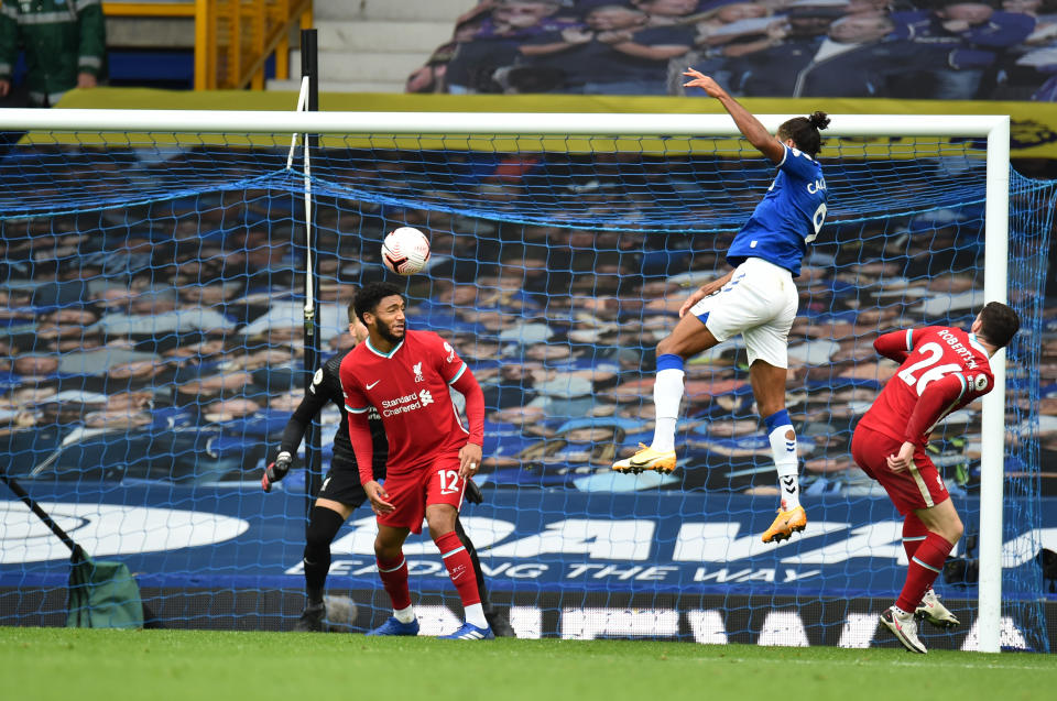 LIVERPOOL, ENGLAND - OCTOBER 17: (THE SUN OUT, THE SUN ON SUNDAY OUT )Everton's Dominic Calvert-Lewin scores the second goal making the score 2-2 during the Premier League match between Everton and Liverpool at Goodison Park on October 17, 2020 in Liverpool, England. Sporting stadiums around the UK remain under strict restrictions due to the Coronavirus Pandemic as Government social distancing laws prohibit fans inside venues resulting in games being played behind closed doors. (Photo by Andrew Powell/Liverpool FC via Getty Images)