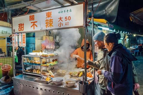 One of Taiwan's countless night markets - Credit: GETTY