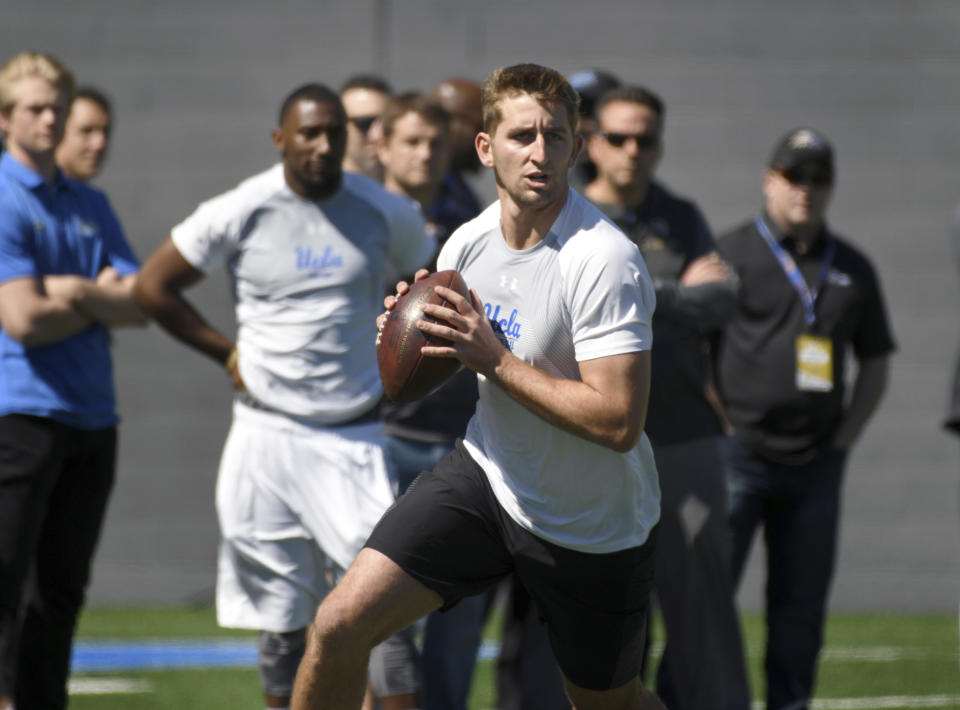 NFL Draft prospect Josh Rosen rolls out during UCLA’s pro day. (AP Photo)