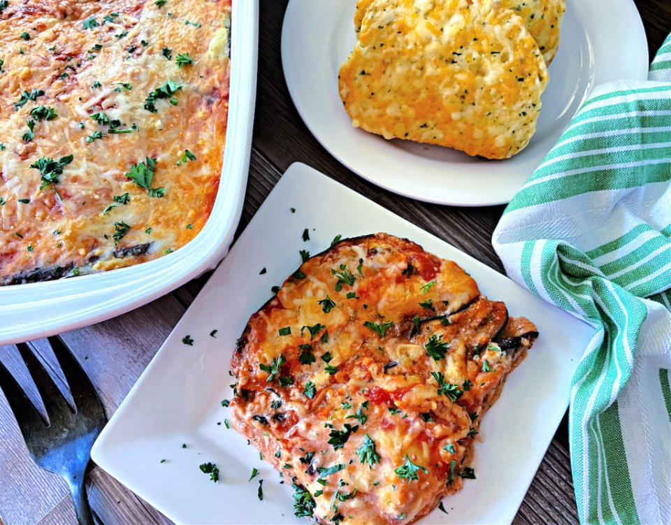 <p>Krista Marshall</p><p>This simple dinner uses fresh eggplant (perfect timing with summer produce right now), jarred marinara and a creamy ricotta mixture to mimic a traditional lasagna recipe. Each layer is packed with flavor and nobody—not even the biggest pasta lover—will be able to resist it. It's basically eggplant Parmesan without the breading!</p><p><strong>Get the recipe: </strong><strong><a href="https://parade.com/recipes/eggplant-lasagna" rel="nofollow noopener" target="_blank" data-ylk="slk:Low-Carb Eggplant Lasagna;elm:context_link;itc:0;sec:content-canvas" class="link ">Low-Carb Eggplant Lasagna </a></strong></p>