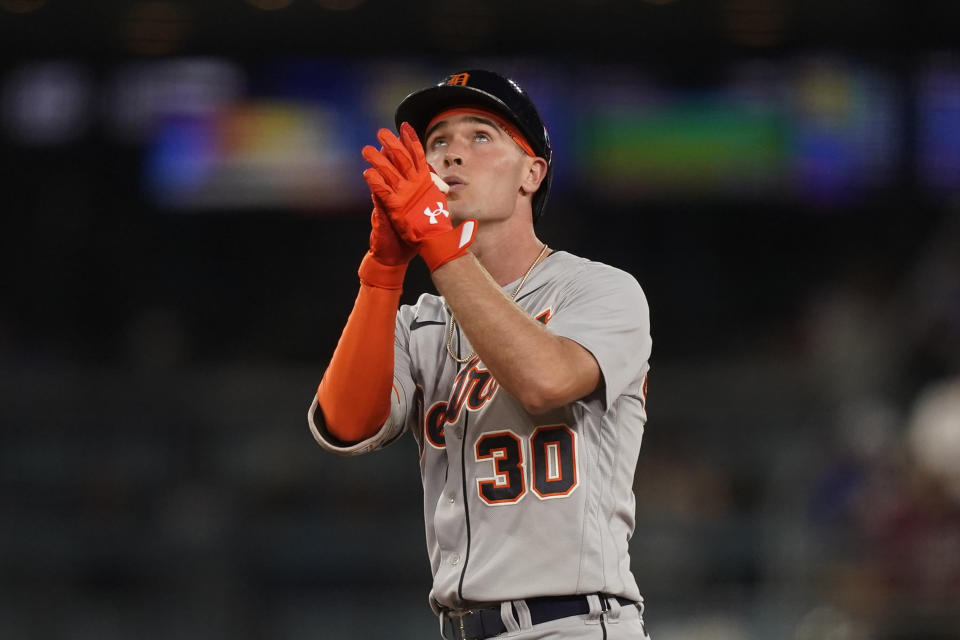 Detroit Tigers' Kerry Carpenter celebrates after hitting a double during the third inning of a baseball game against the Los Angeles Dodgers, Monday, Sept. 18, 2023, in Los Angeles. (AP Photo/Ryan Sun)