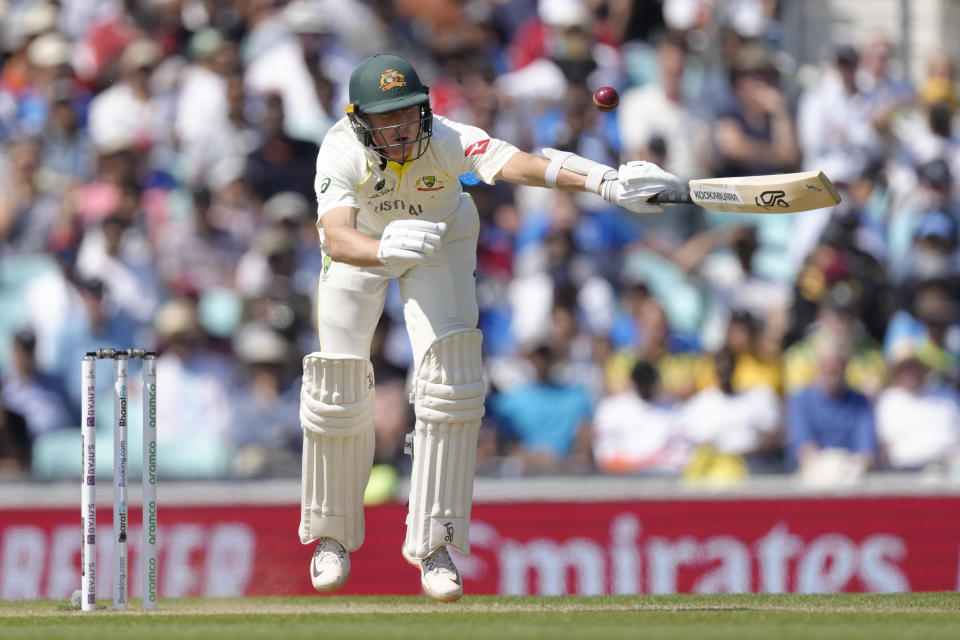 Australia's Marnus Labuschagne attempts plays a shot and falls to the ground on the third day of the ICC World Test Championship Final between India and Australia at The Oval cricket ground in London, Friday, June 9, 2023. (AP Photo/Kirsty Wigglesworth)