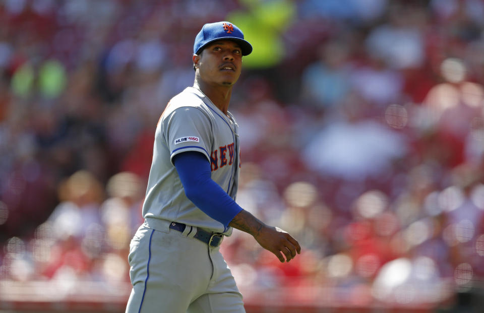 New York Mets starting pitcher Marcus Stroman reacts as he is pulled during the fifth inning of a baseball game, against the Cincinnati Reds Sunday, Sept. 22, 2019, in Cincinnati. (AP Photo/Gary Landers)