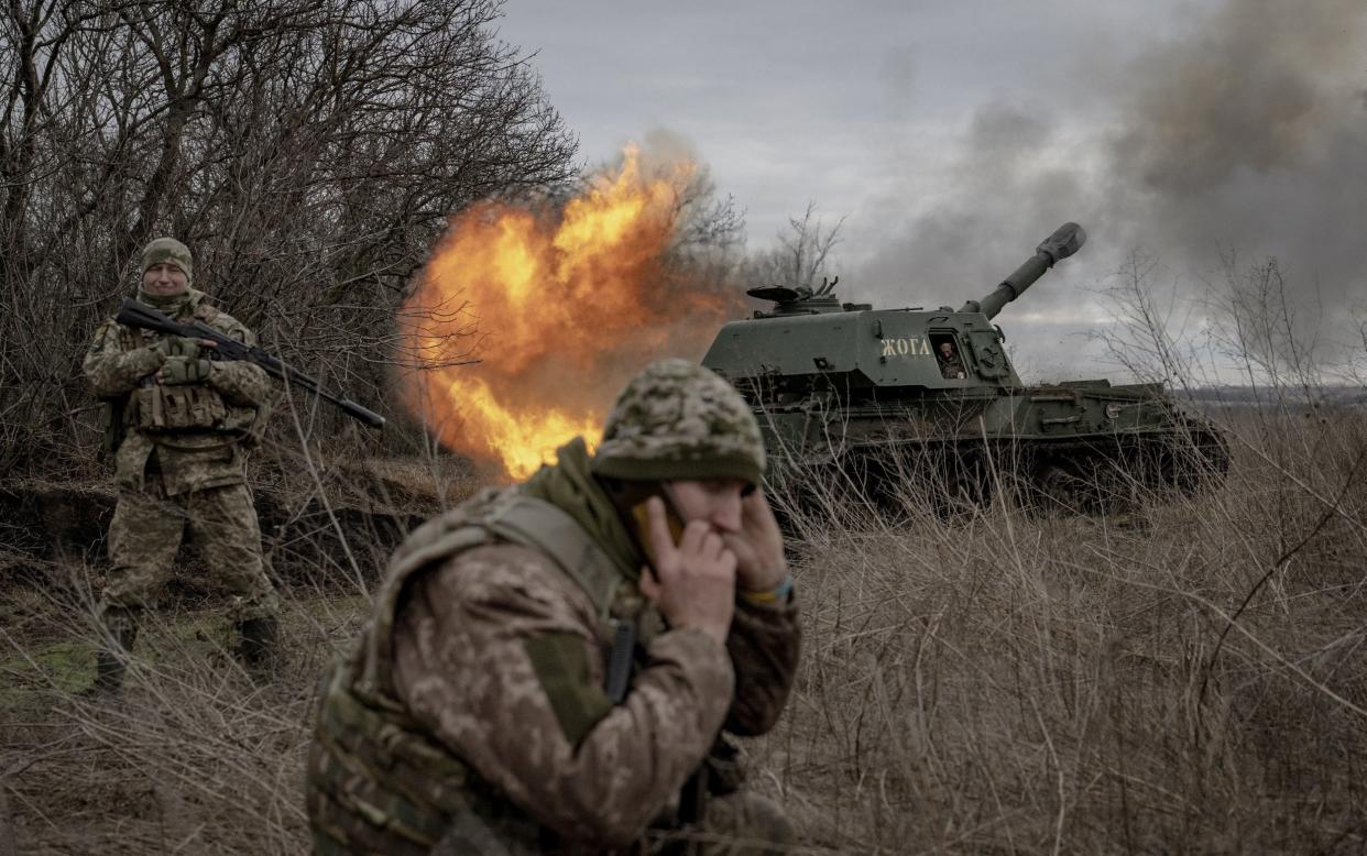 Soldiers from an Ukrainian artillery unit wait for ammunition assistance at the front line in the direction of Avdiivka