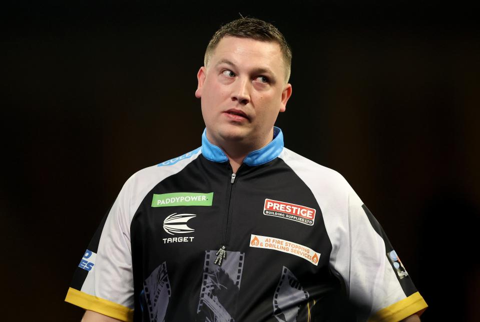 Chris Dobey looks on against Rob Cross (Getty Images)