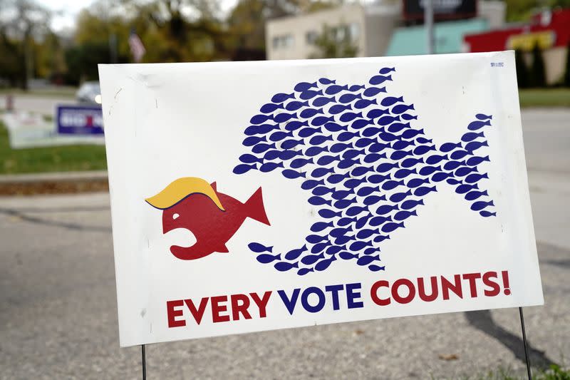 A sign encouraging voter turnout is seen at a campaign yard sign distribution site for U.S. Democratic presidential candidate Joe Biden and his running mate, Senator Kamala Harris, in Madison, Wisconsin