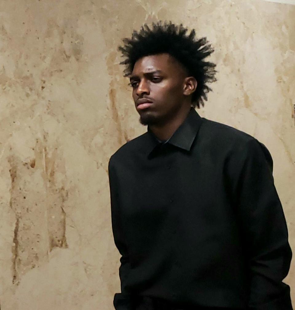 Darius Johnson, 19, walks out of the 140th a District Court during a break in his trial. His attorneys are arguing that Johnson acted in self defense on June 5, 2022, when he shot and killed 39-year-old Steven Colon in the front yard of his home in Central Lubbock.