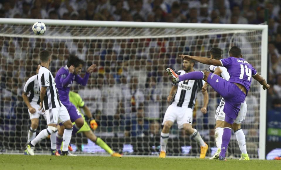 <p>Real Madrid’s Casemiro, right, scores his sides’ second goal during the Champions League final soccer match between Juventus and Real Madrid at the Millennium stadium in Cardiff, Wales </p>