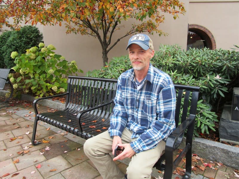 Sean Fowler, 43, poses in Lewiston