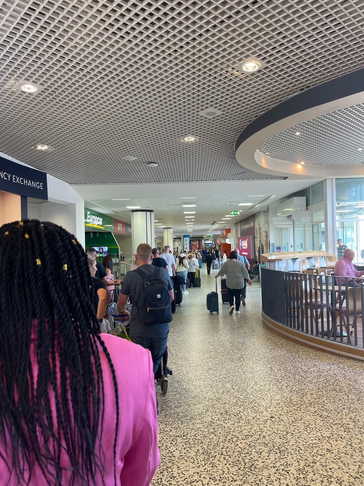 Large numbers of passengers queuing inside Birmingham Airport on Saturday. (Reach)