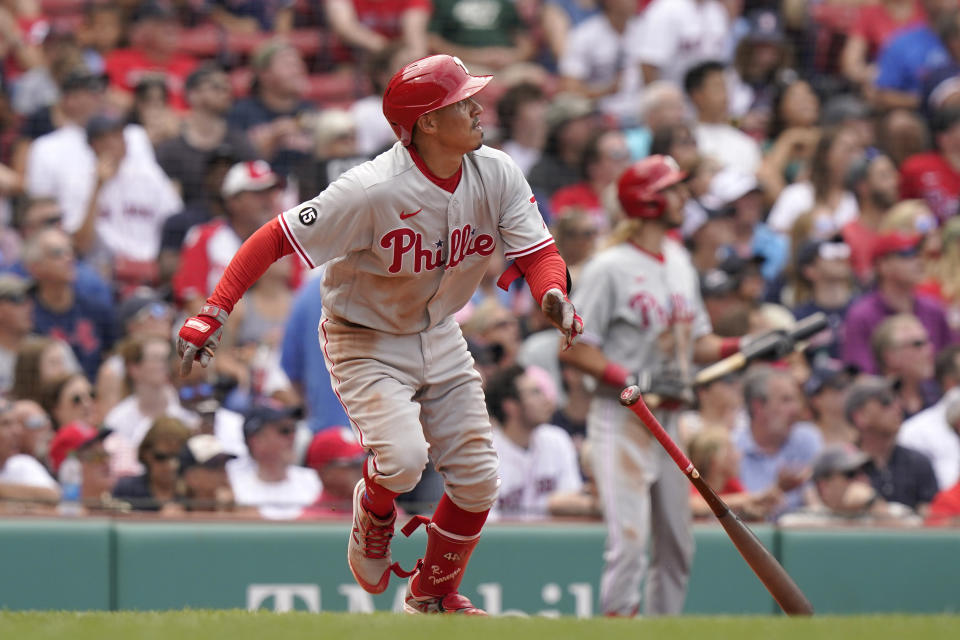 Philadelphia Phillies' Ronald Torreyes watches the flight of his three-run home run in the fourth inning of a baseball game against the Boston Red Sox, Sunday, July 11, 2021, in Boston. (AP Photo/Steven Senne)