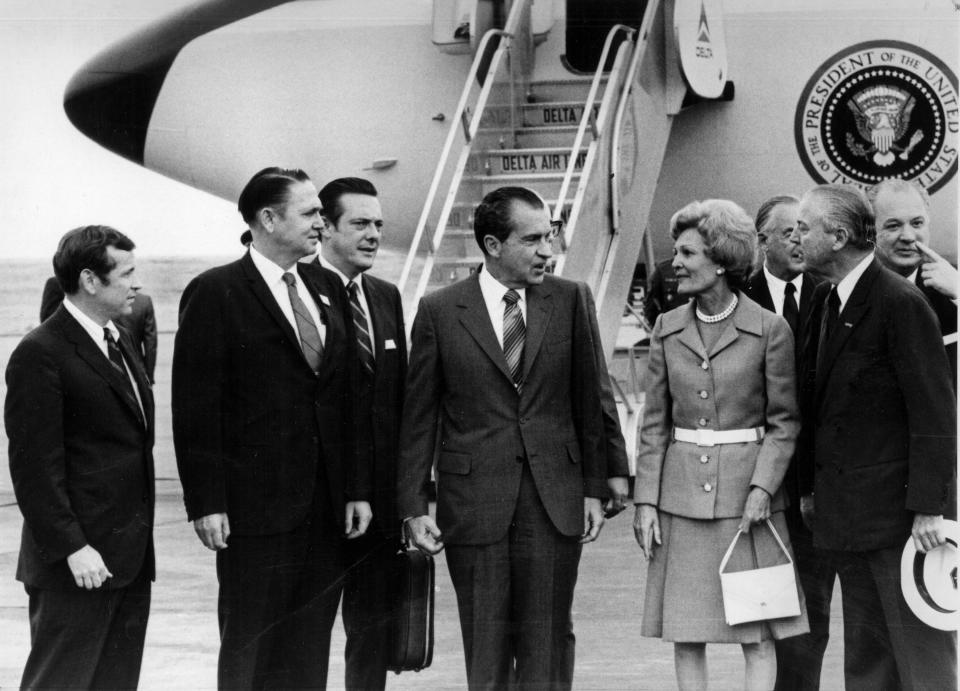 In a May 28, 1970, photograph, President Richard Nixon arrives for the Billy Graham Knoxville Crusade. Pictured are U.S. Sen. Howard H. Baker, Jr., left, U.S. Rep. John J. Duncan, Sr., U.S. Rep. Bill Brock III, Nixon, and First Lady Pat Nixon. (News Sentinel Archive)