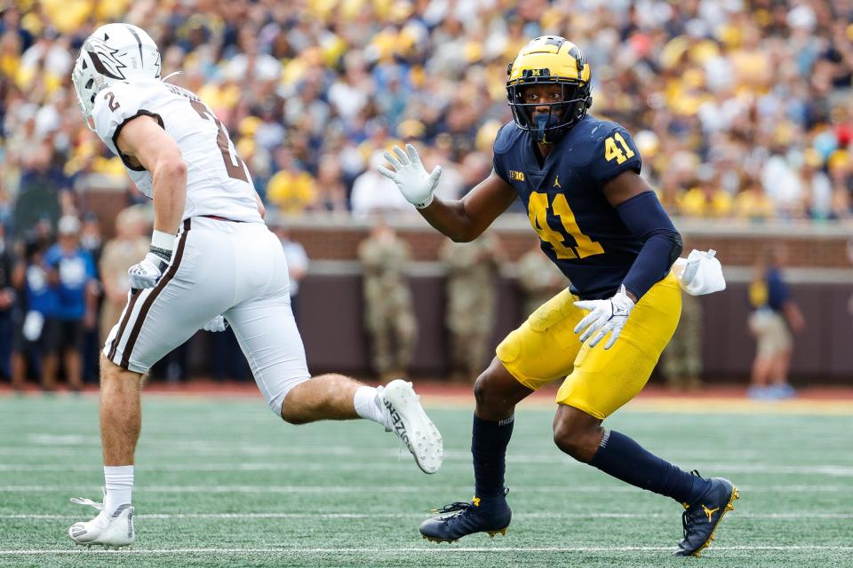 Michigan linebacker Nikhai Hill-Green (41) chases Western Michigan safety Bricen Garner (2) during the first half Saturday, Sept. 4, 2021 at Michigan Stadium in Ann Arbor.